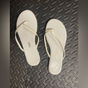 Tkees, size 8, discolored foot bottom